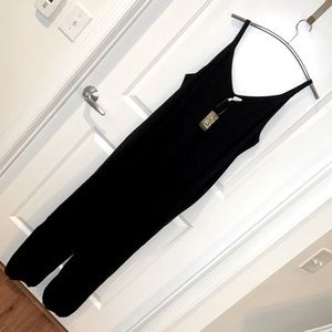 SUZANNE BETRO | NWT Black Women’s SUZANNE BETRO Loose Fit Jumpsuit, Size Small.